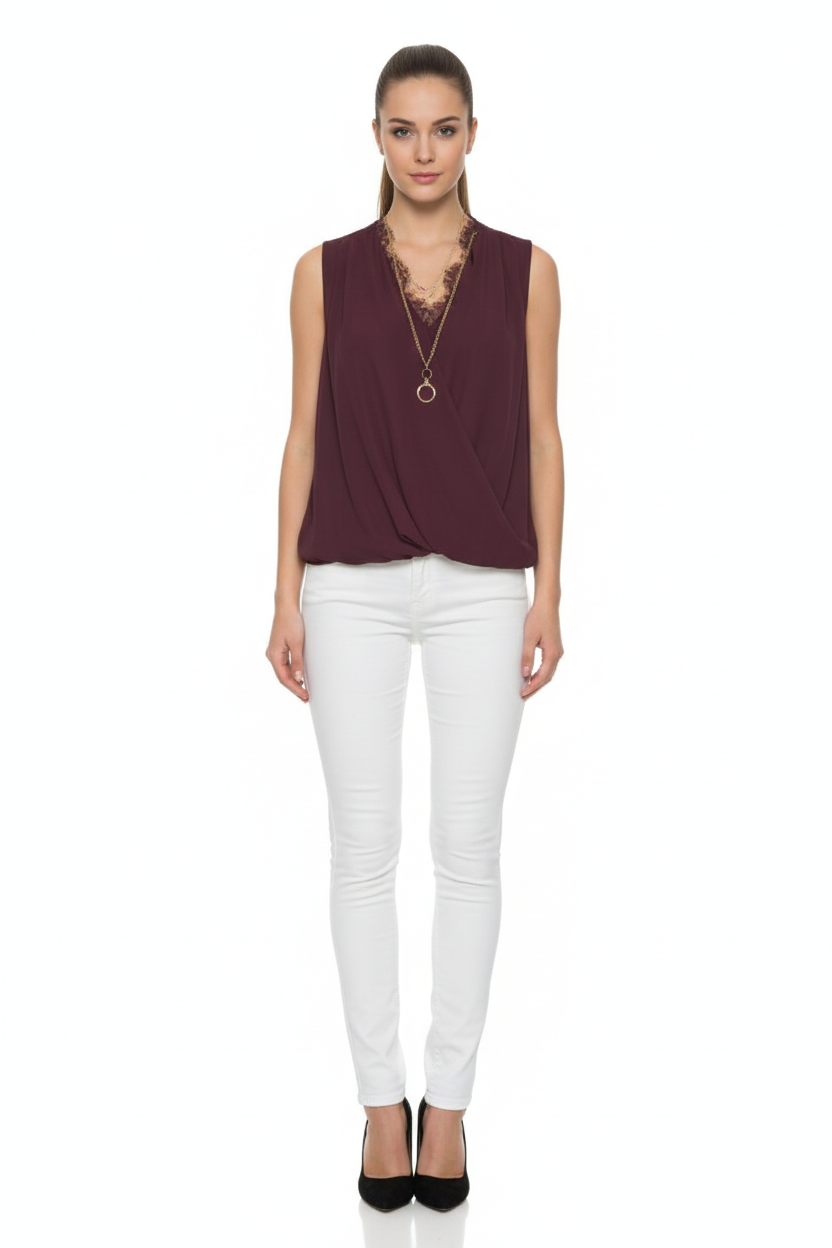 BSB Sleeveless wrap blouse with lace and bejeweled necklace