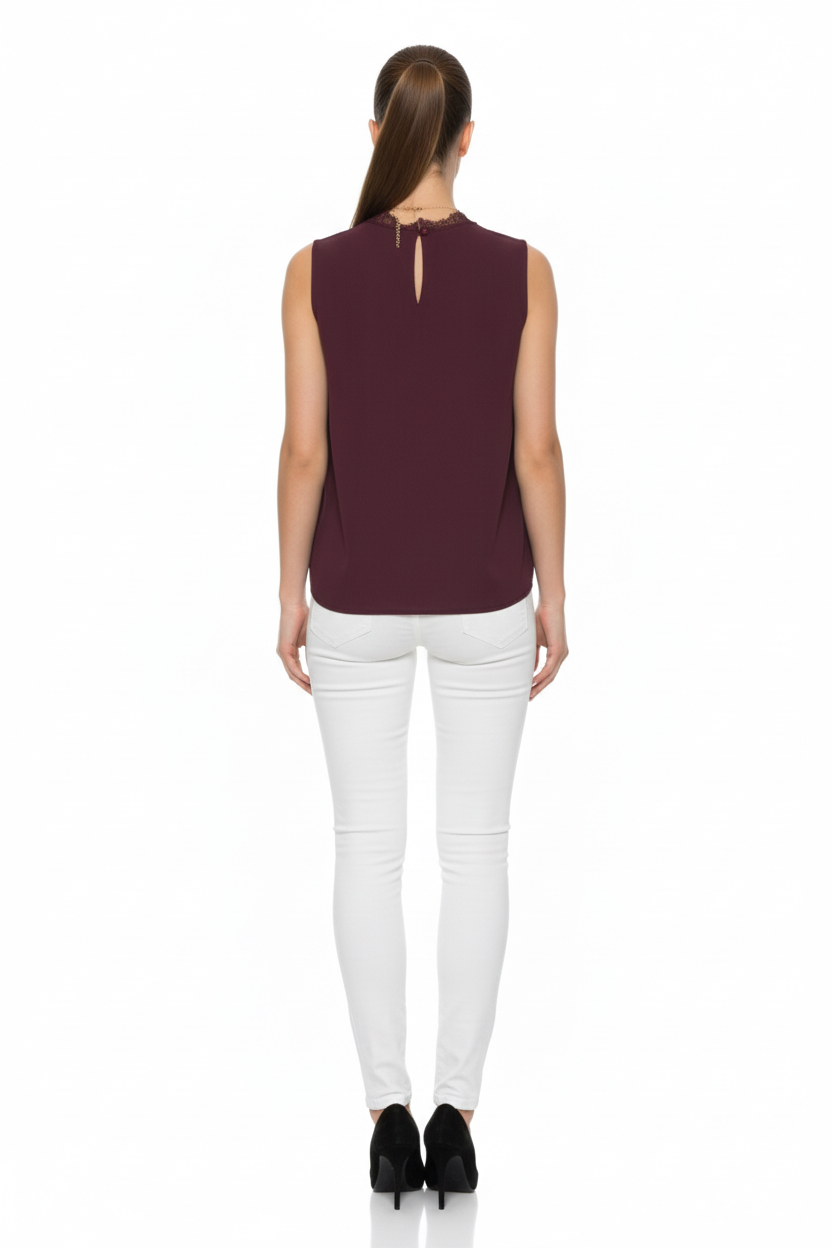 BSB Sleeveless wrap blouse with lace and bejeweled necklace