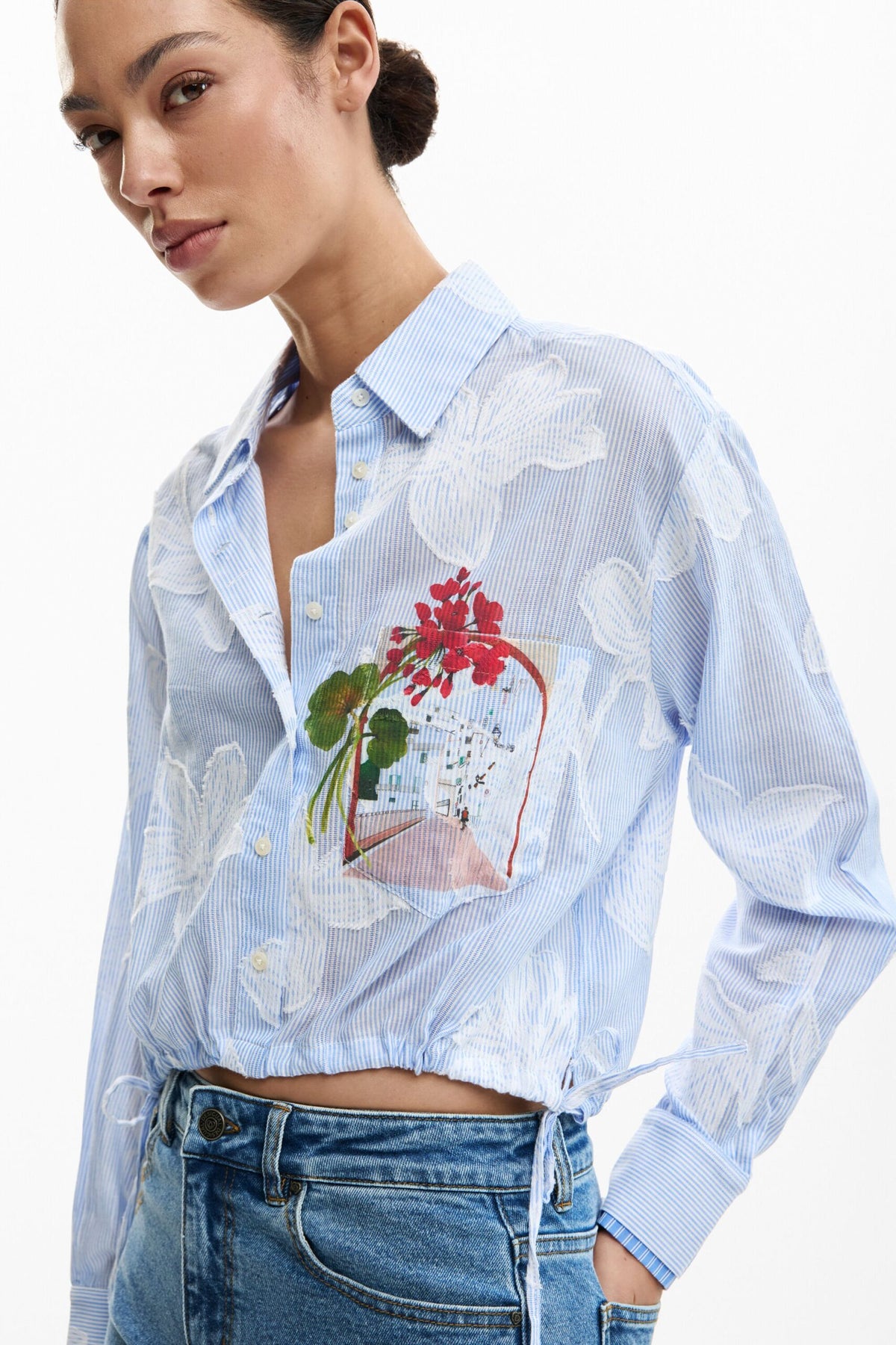 Desigual cotton fabric shirt with digital floral print on the front. Shirt collar