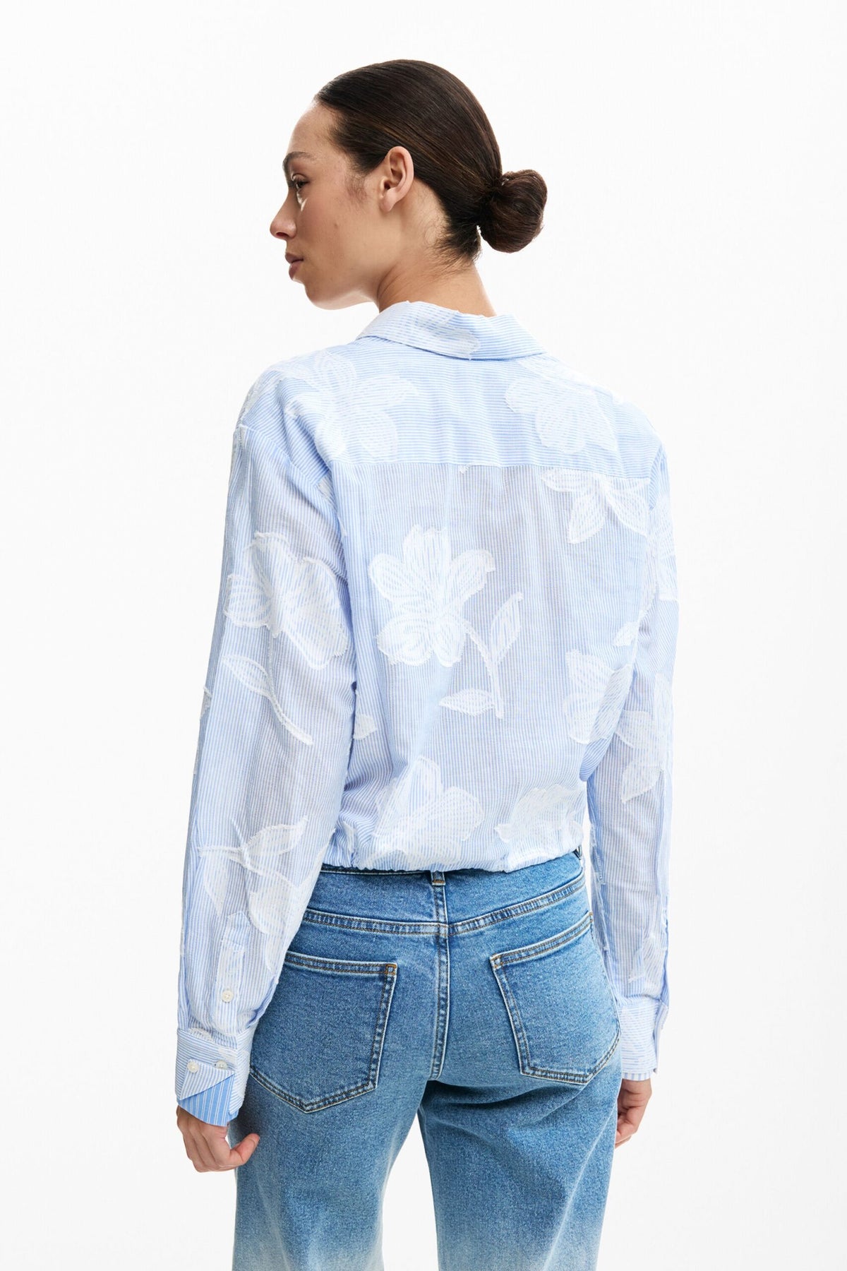 Desigual cotton fabric shirt with digital floral print on the front. Shirt collar