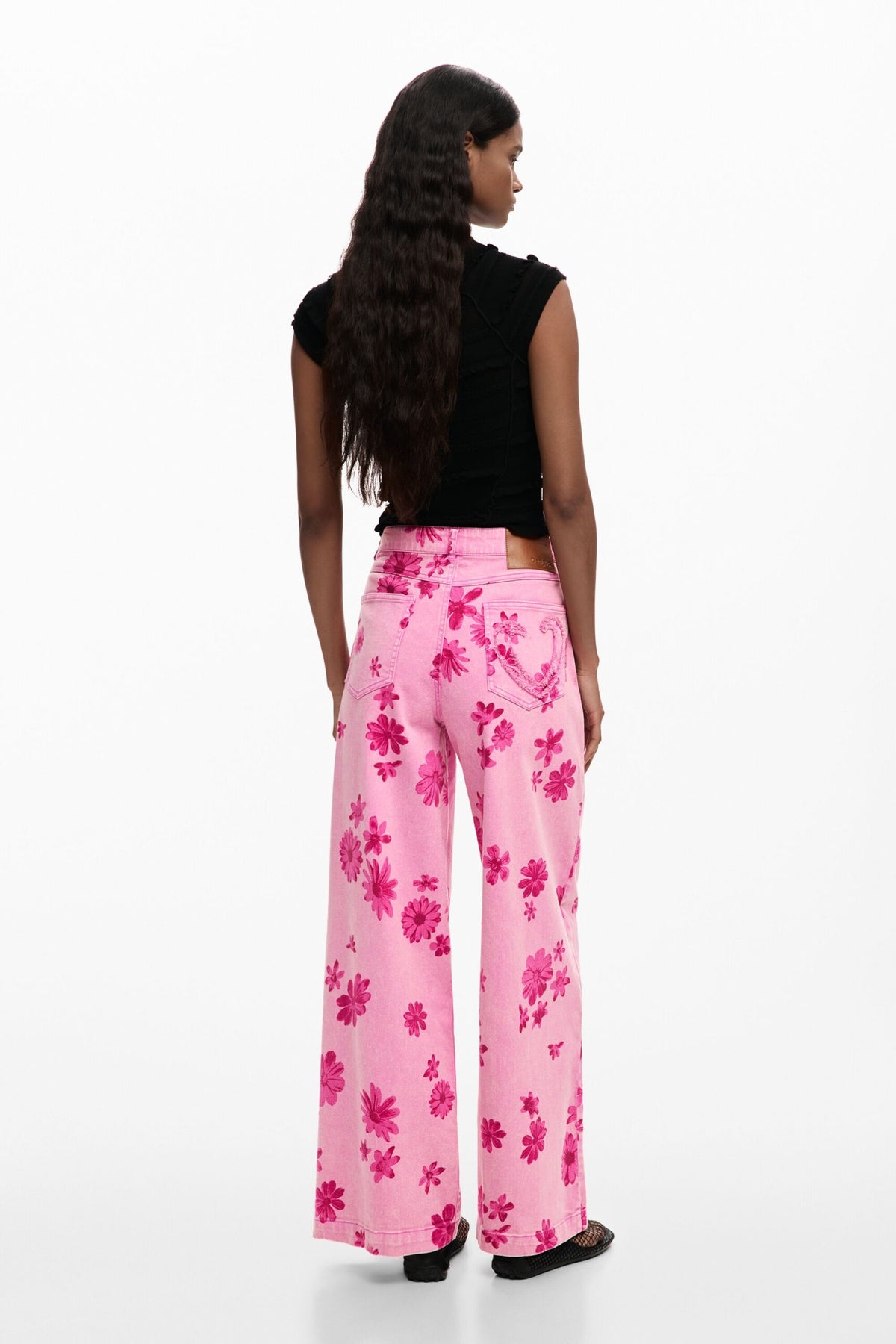 Desigual Denim trousers, wide leg cut, with flower print and five pockets.