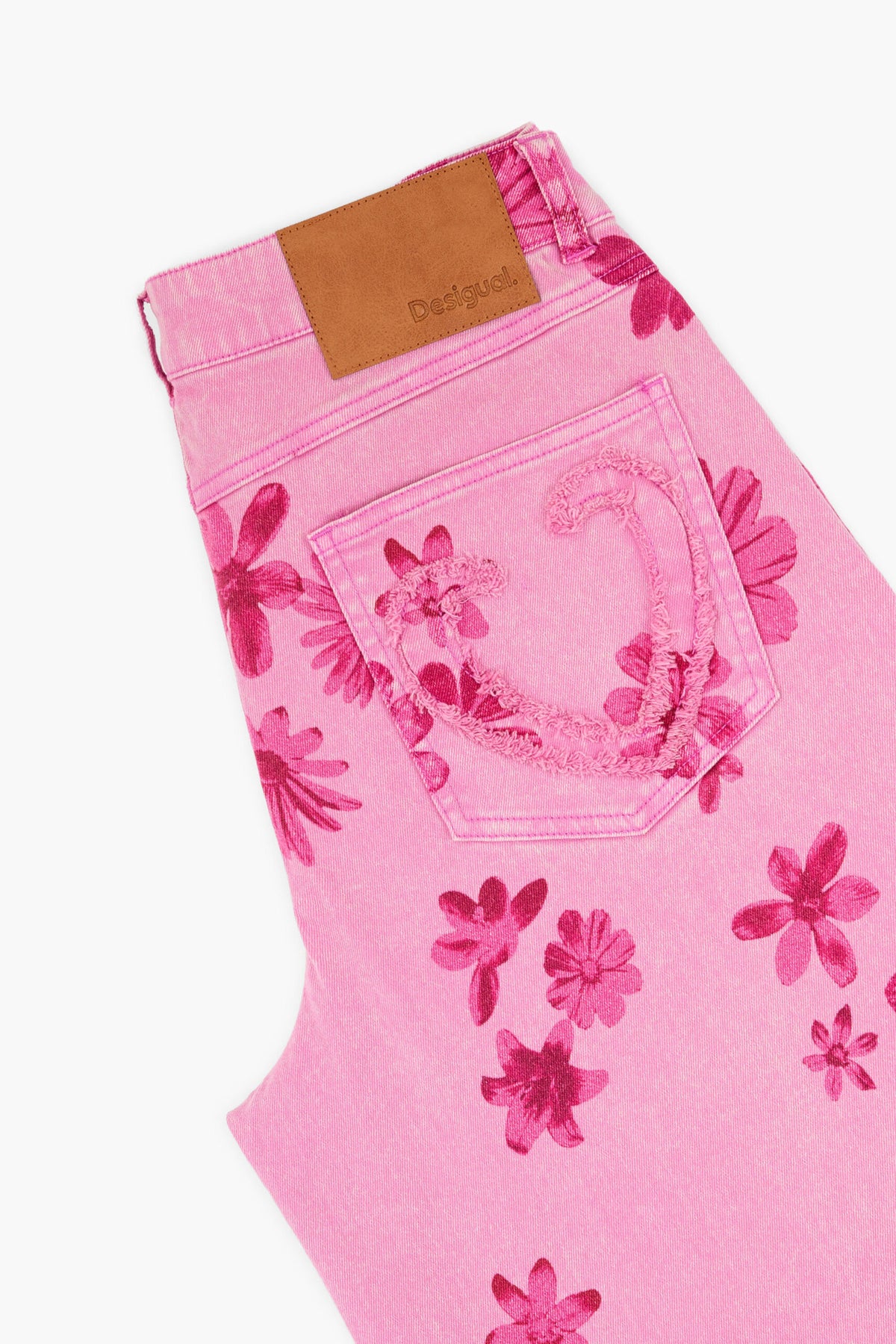 Desigual Denim trousers, wide leg cut, with flower print and five pockets.