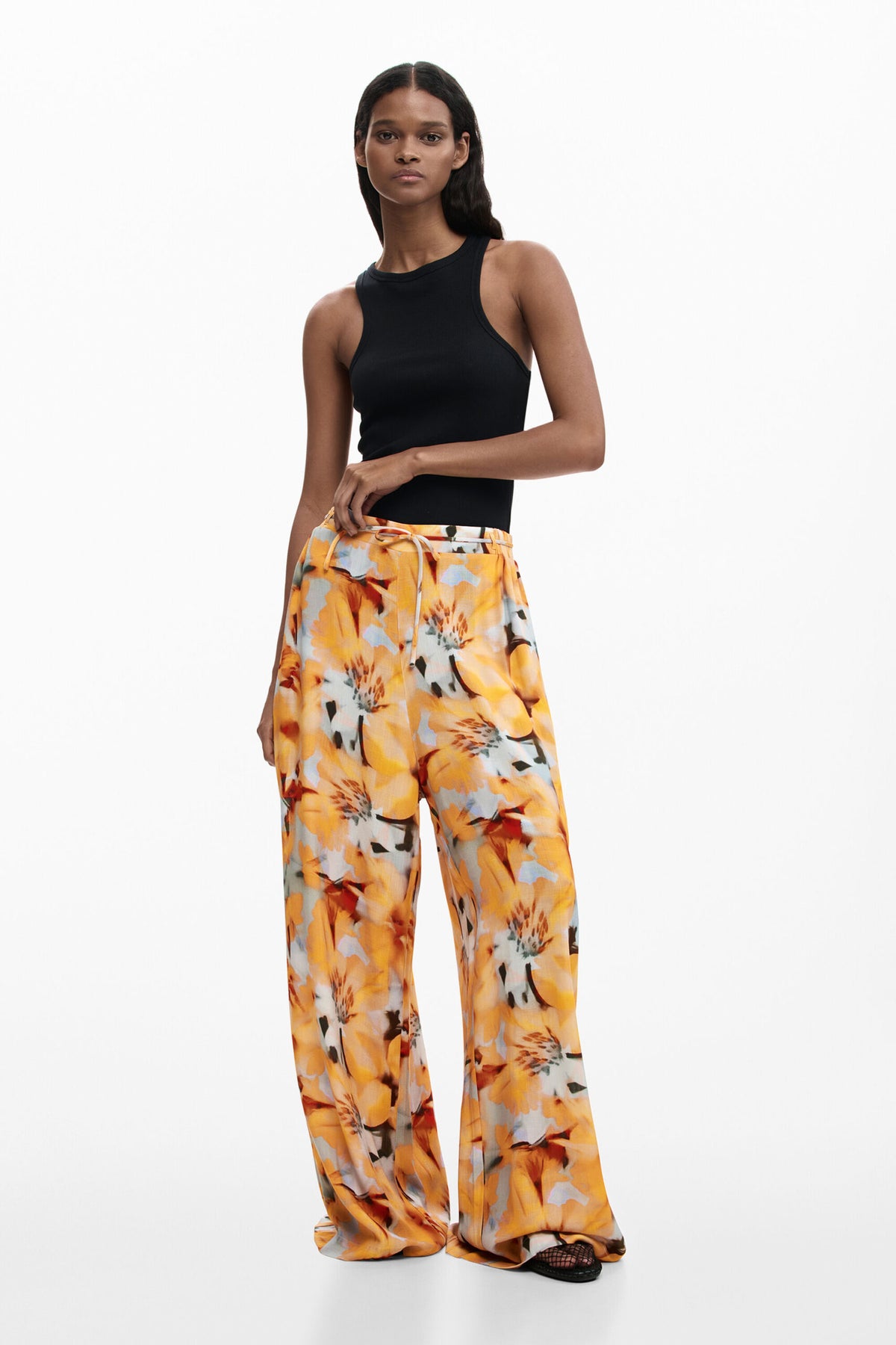 Desigual Long viscose fabric trousers with a floral print in blue and yellow tones