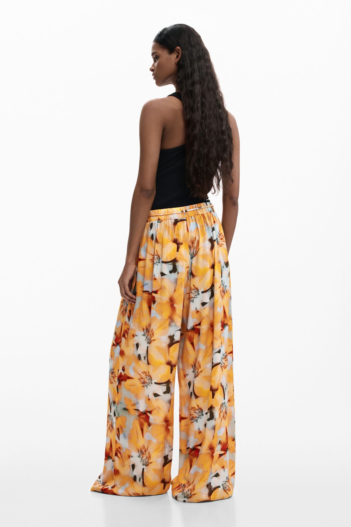 Desigual Long viscose fabric trousers with a floral print in blue and yellow tones