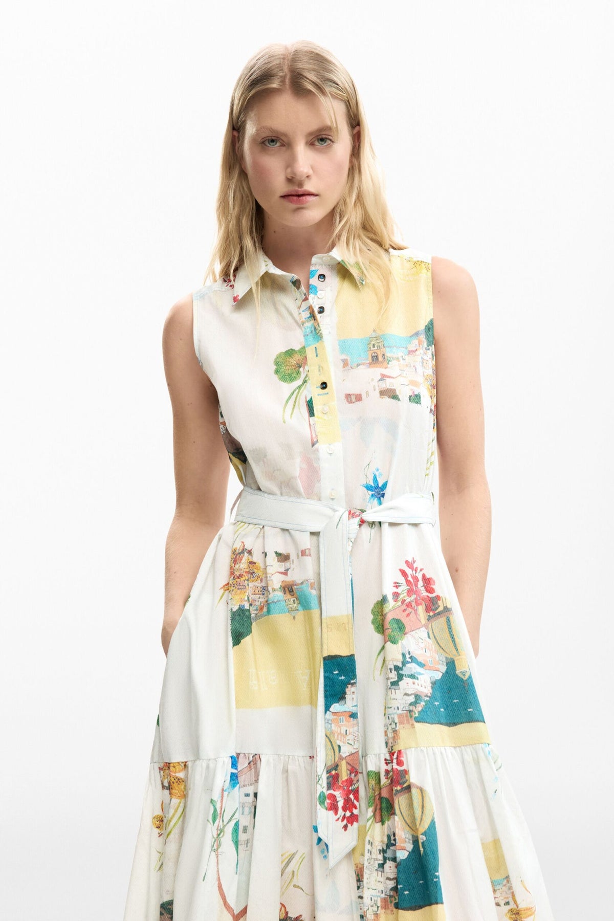 Desigual Sleeveless long dress with belt, flounced hem and postcard and flower print .