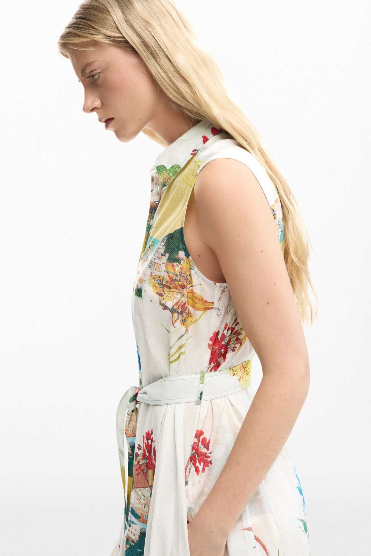 Desigual Sleeveless long dress with belt, flounced hem and postcard and flower print .