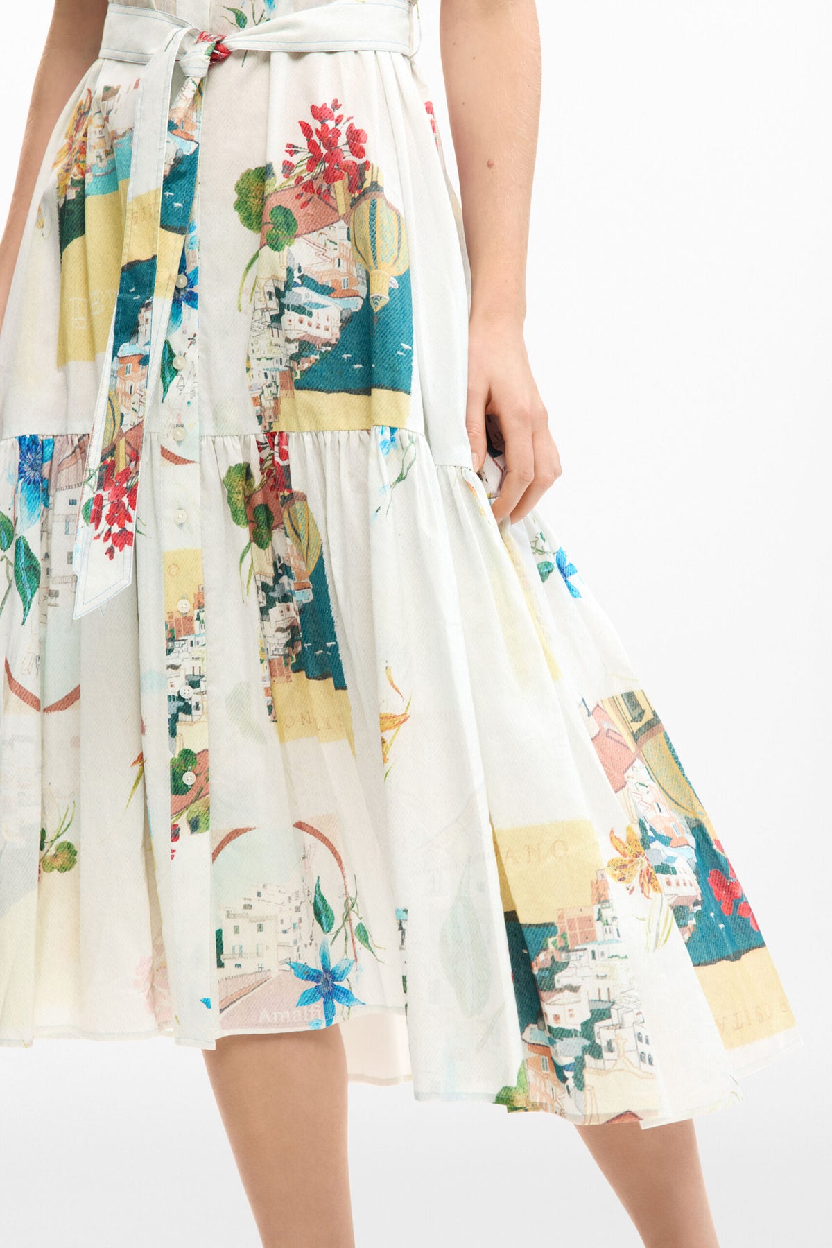 Desigual Sleeveless long dress with belt, flounced hem and postcard and flower print .