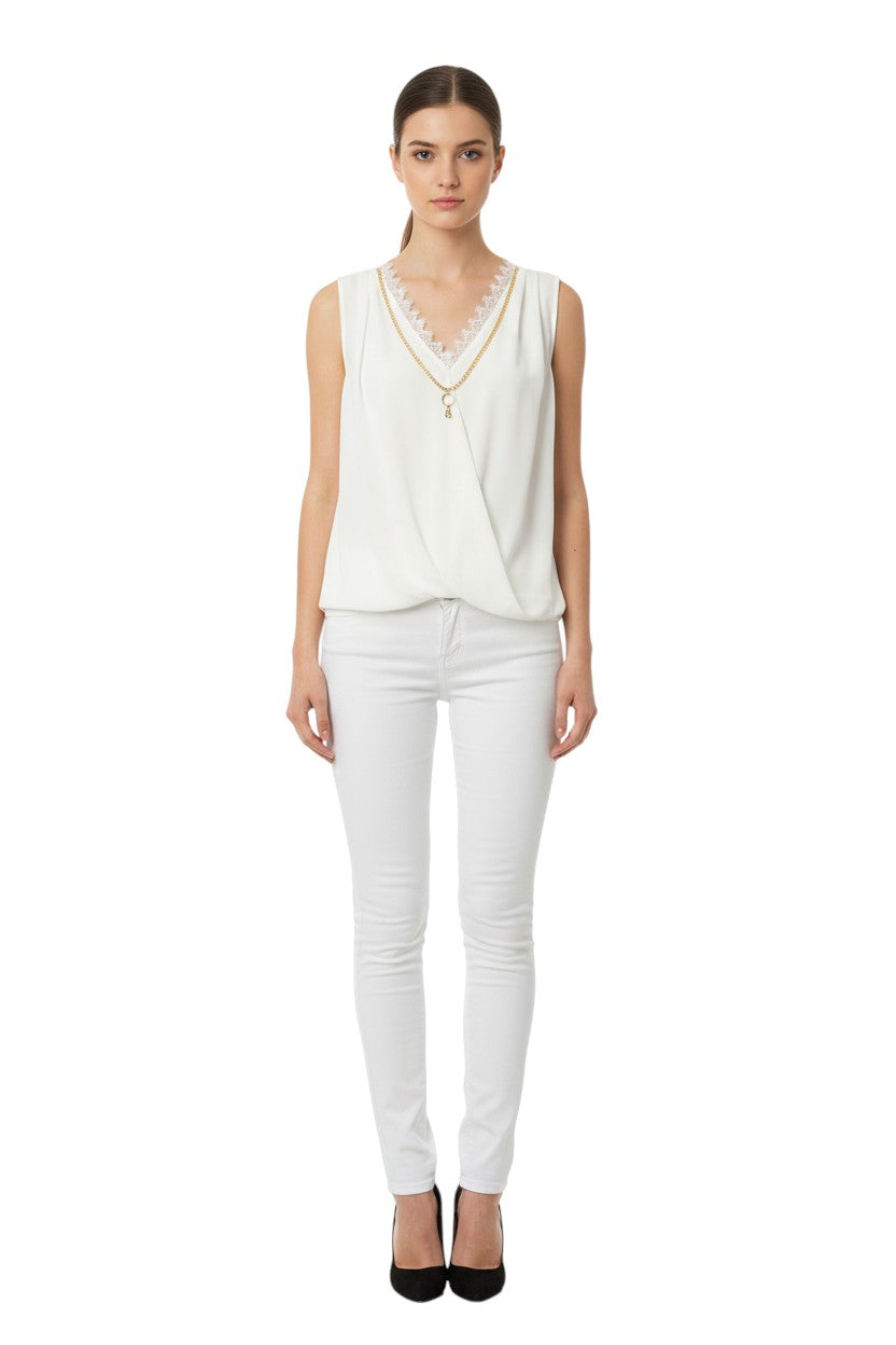 BSB Sleeveless wrap blouse with lace and bejeweled necklace