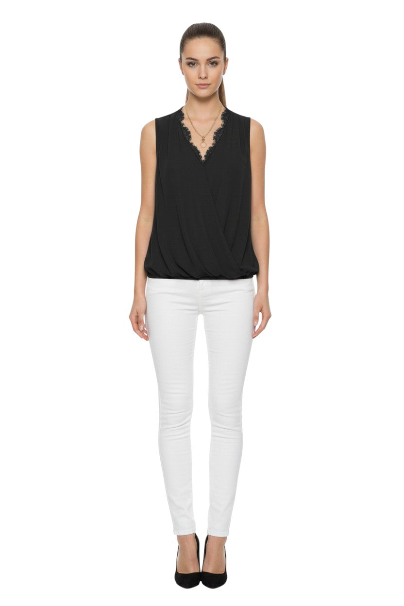 BSB Sleeveless wrap blouse with lace and bejeweled necklace