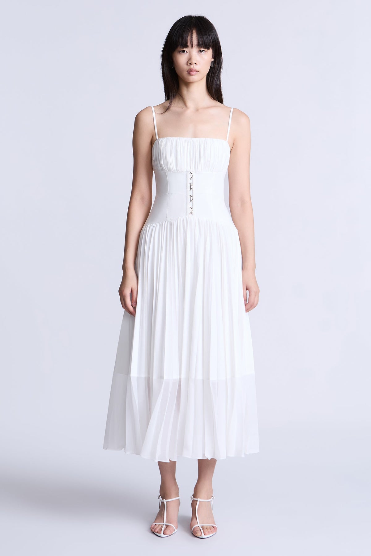 BCBGMAXAZARIA Pleated midi dress crafted from breathable cotton with a soft