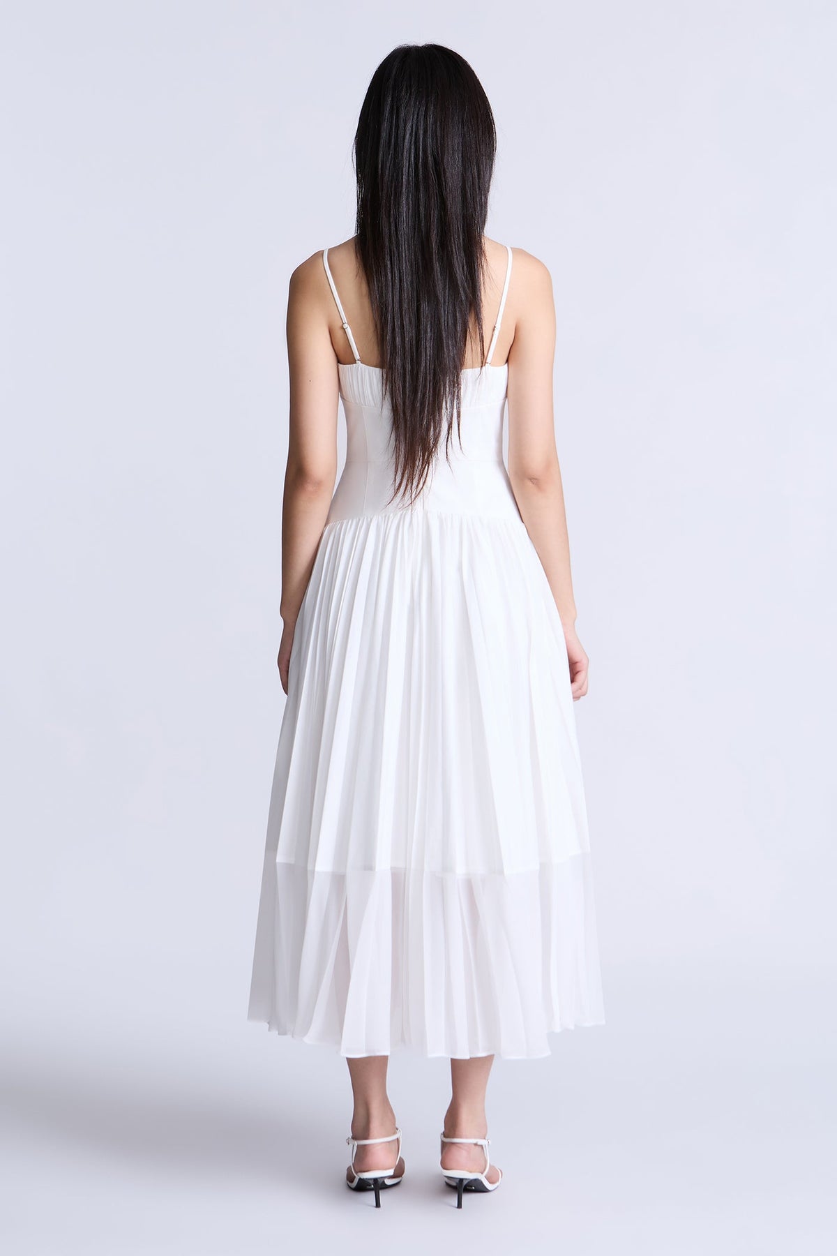 BCBGMAXAZARIA Pleated midi dress crafted from breathable cotton with a soft