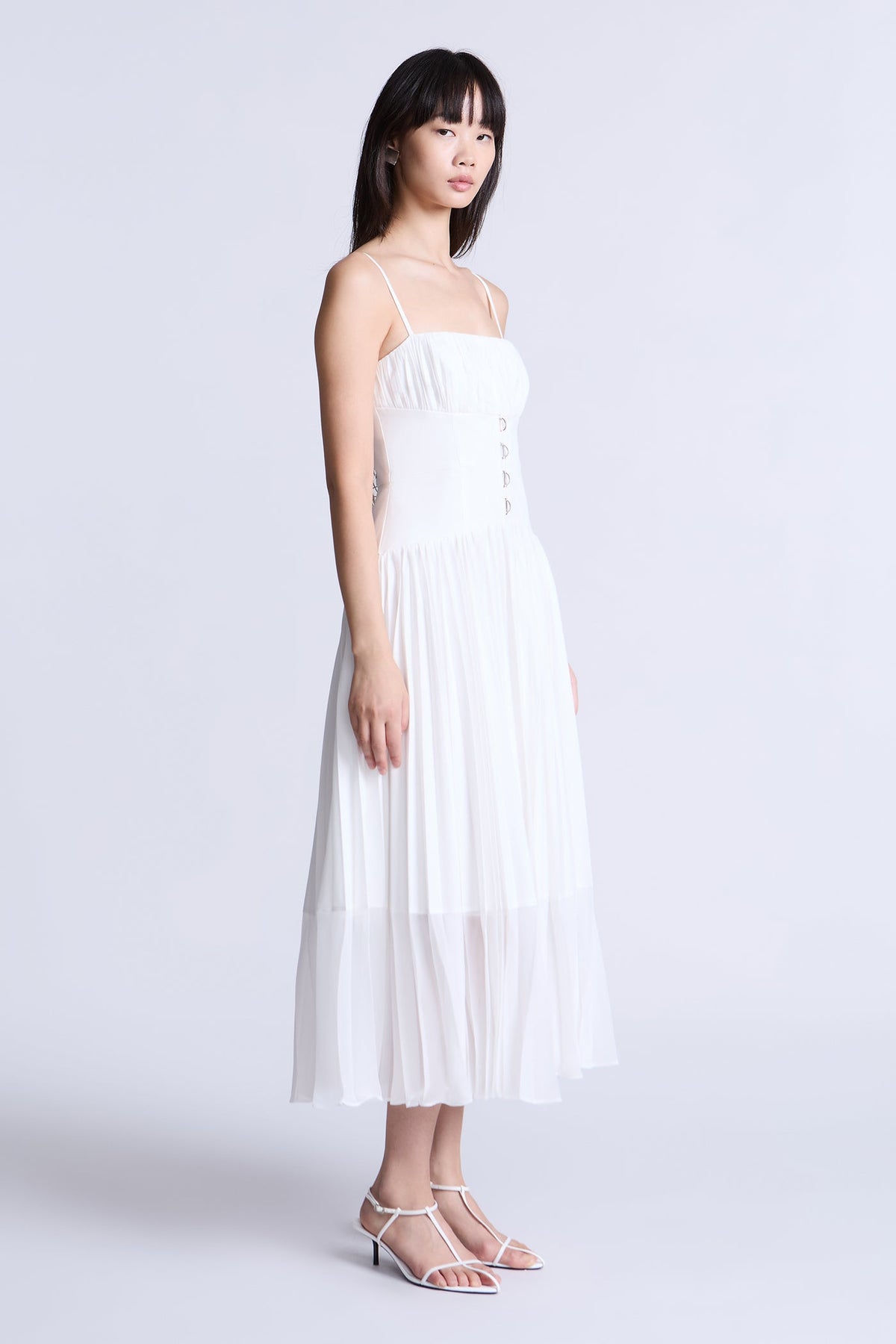 BCBGMAXAZARIA Pleated midi dress crafted from breathable cotton with a soft