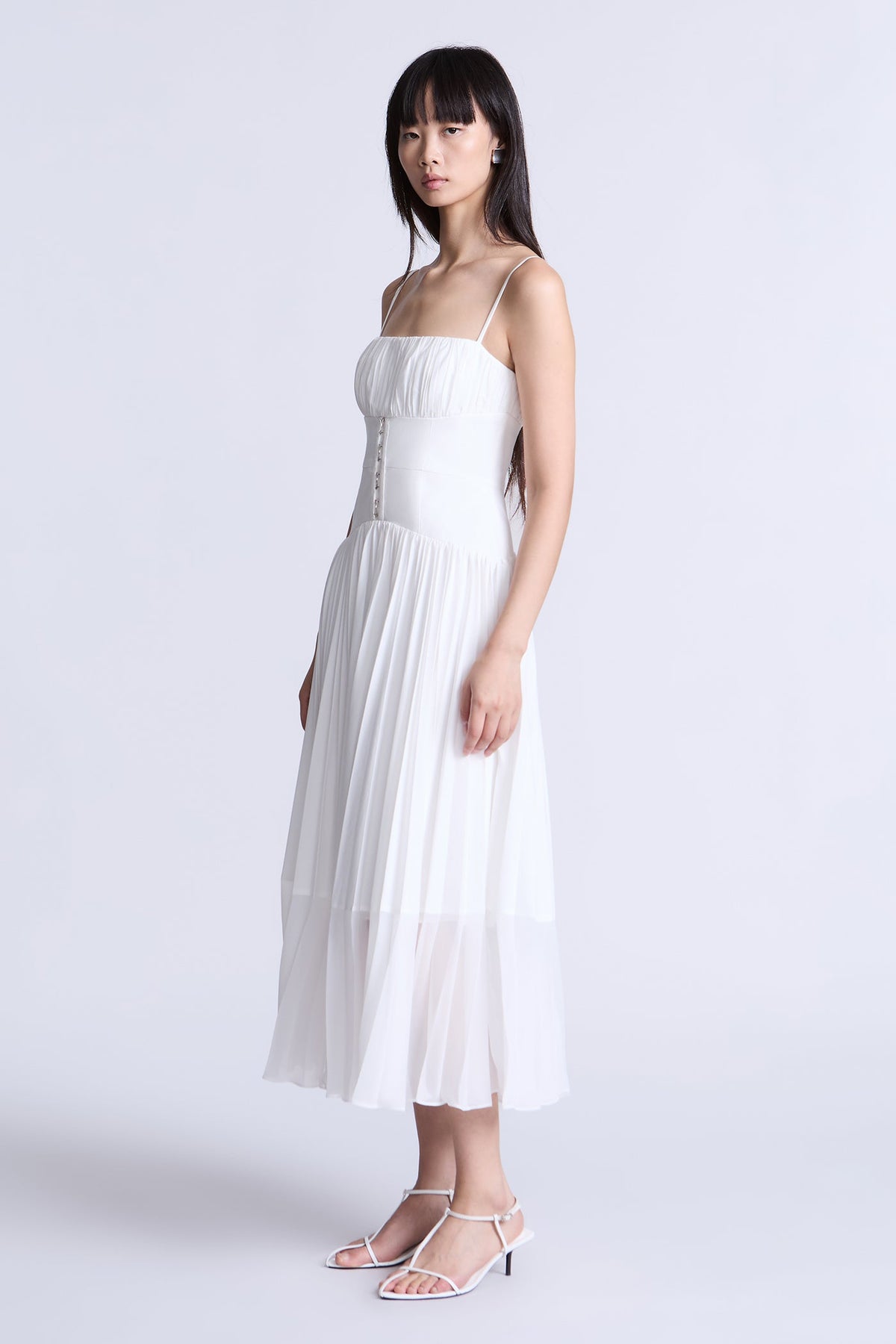 BCBGMAXAZARIA Pleated midi dress crafted from breathable cotton with a soft