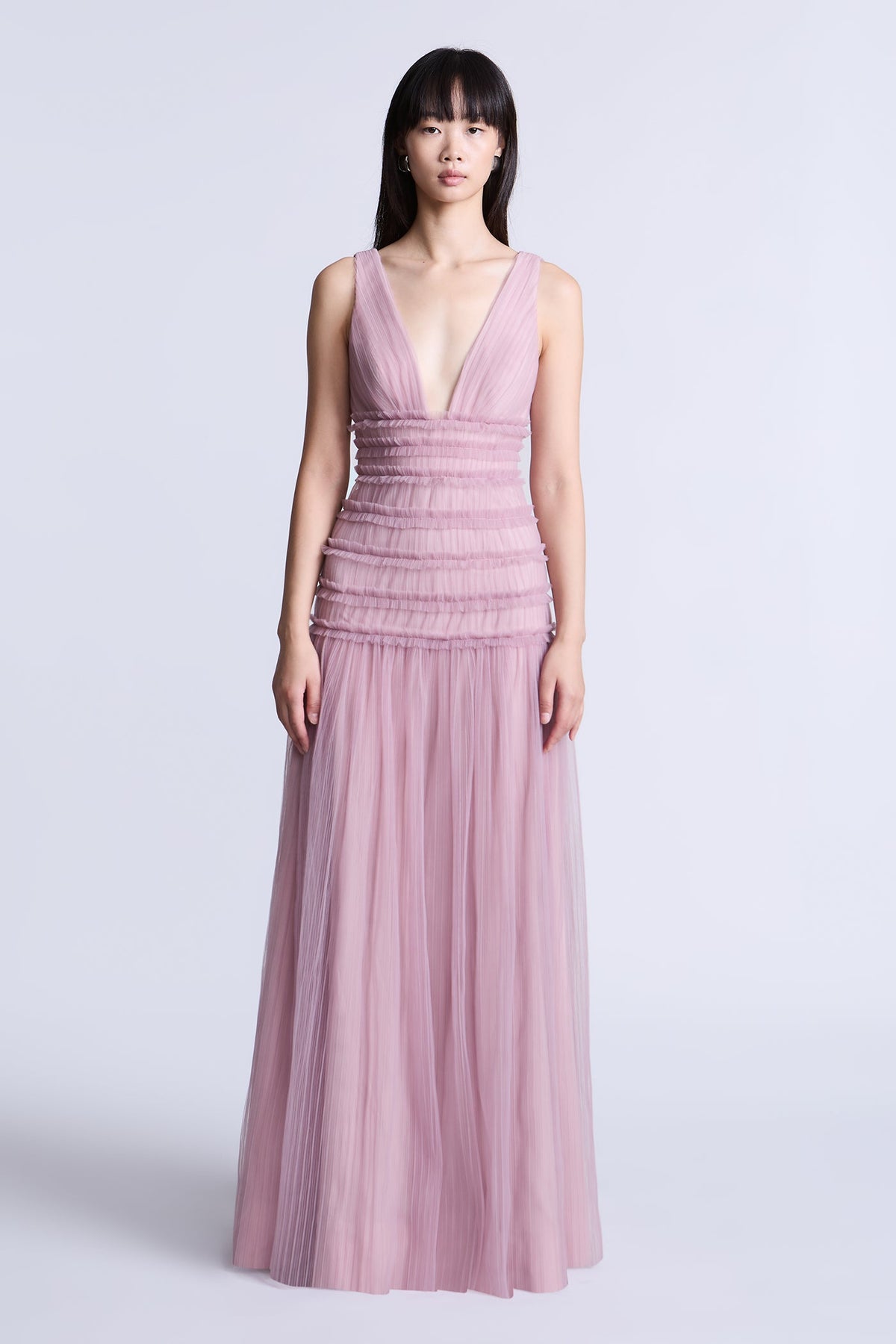 BCBGMAXAZARIA Iris Gown Softly pleated crafted from airy tulle with a fluid weightless feel.