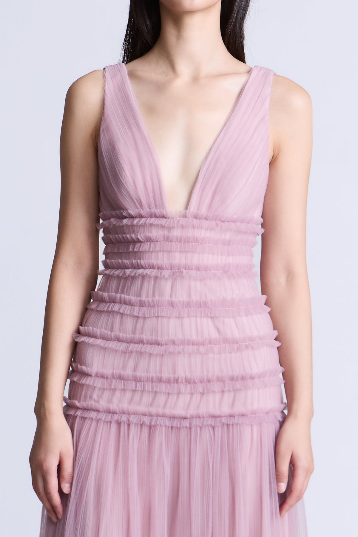 BCBGMAXAZARIA Iris Gown Softly pleated crafted from airy tulle with a fluid weightless feel.