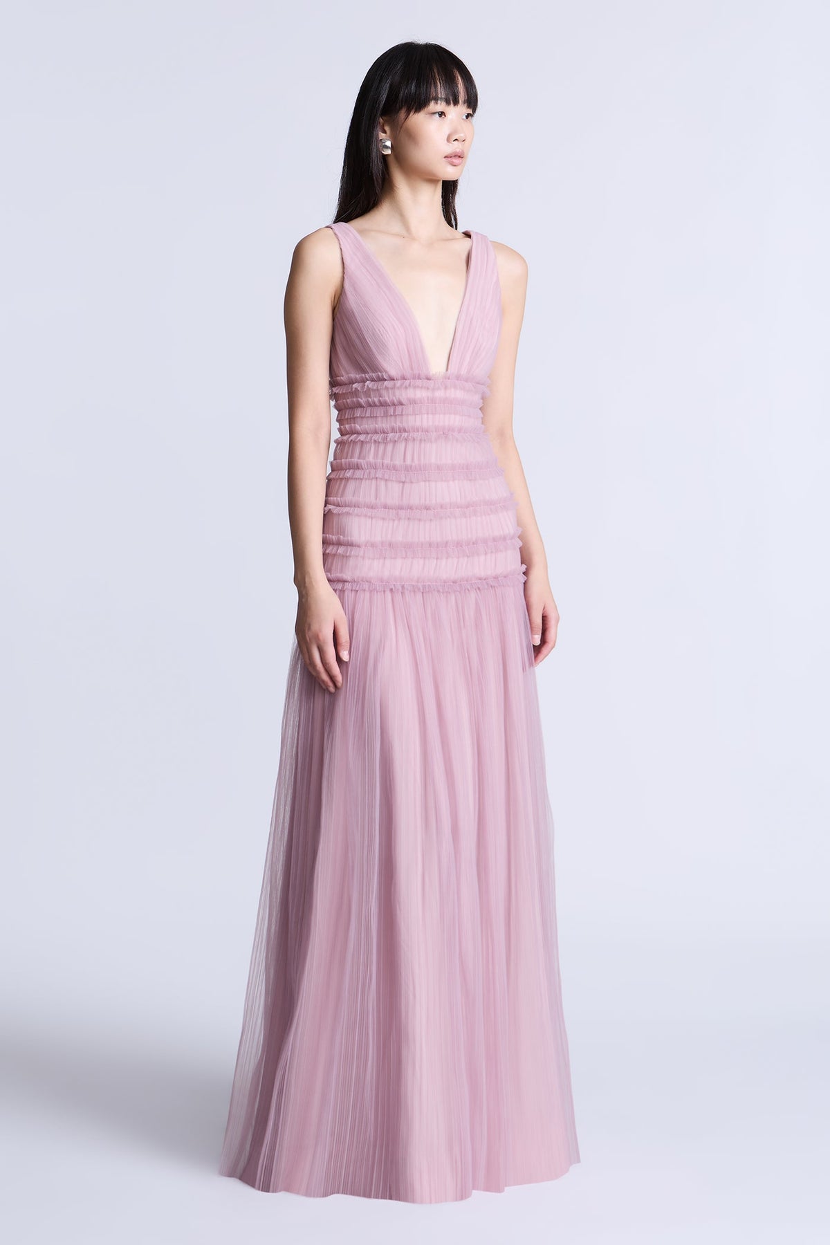 BCBGMAXAZARIA Iris Gown Softly pleated crafted from airy tulle with a fluid weightless feel.