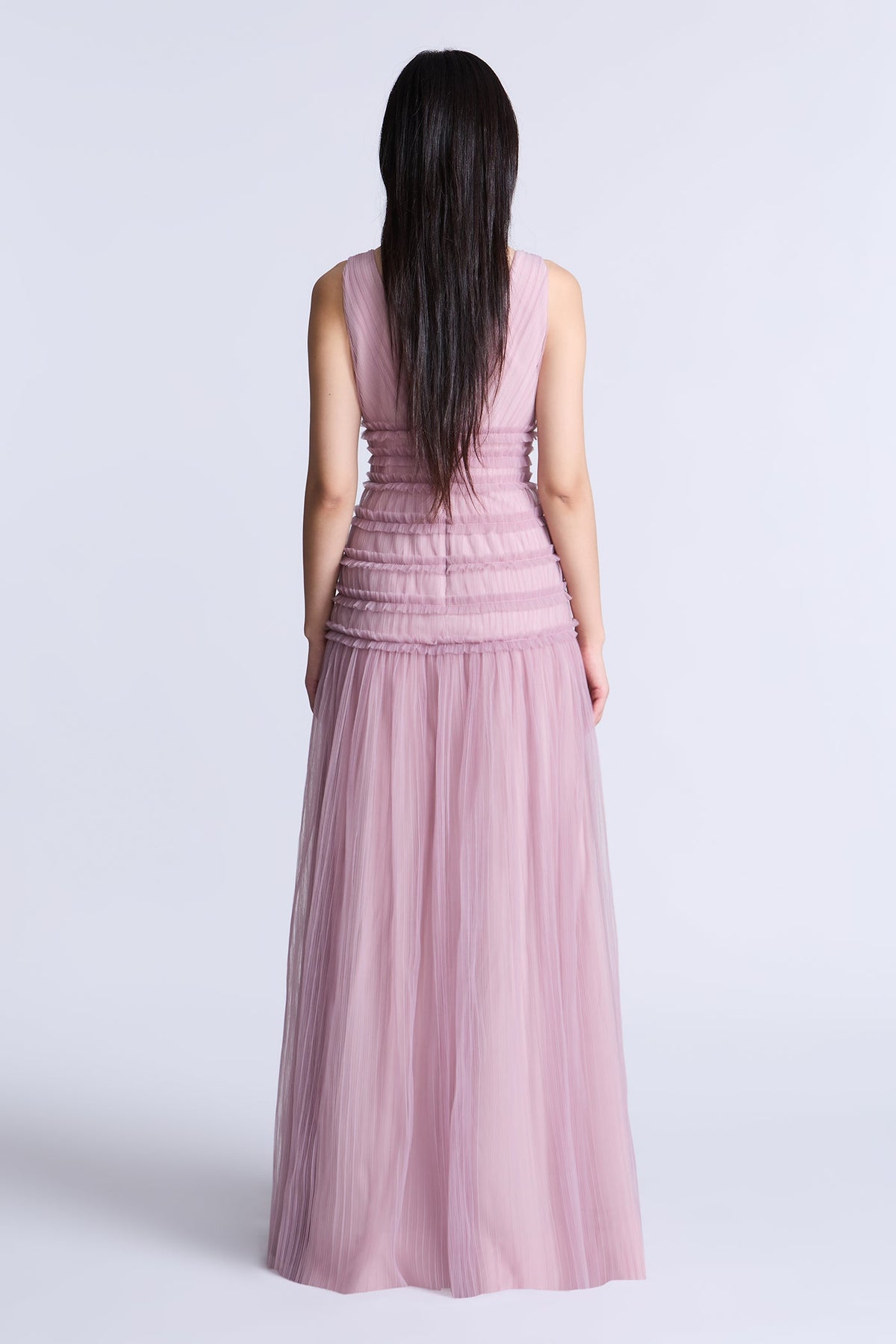 BCBGMAXAZARIA Iris Gown Softly pleated crafted from airy tulle with a fluid weightless feel.