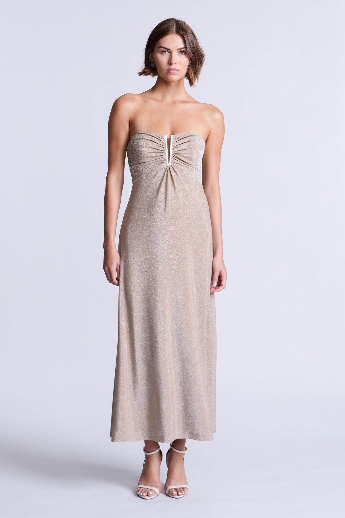 BCBGMAXAZARIA Lola Dress Champagne metallic-knit dress featuring an ankle-length silhouette with an airy fluid flare.