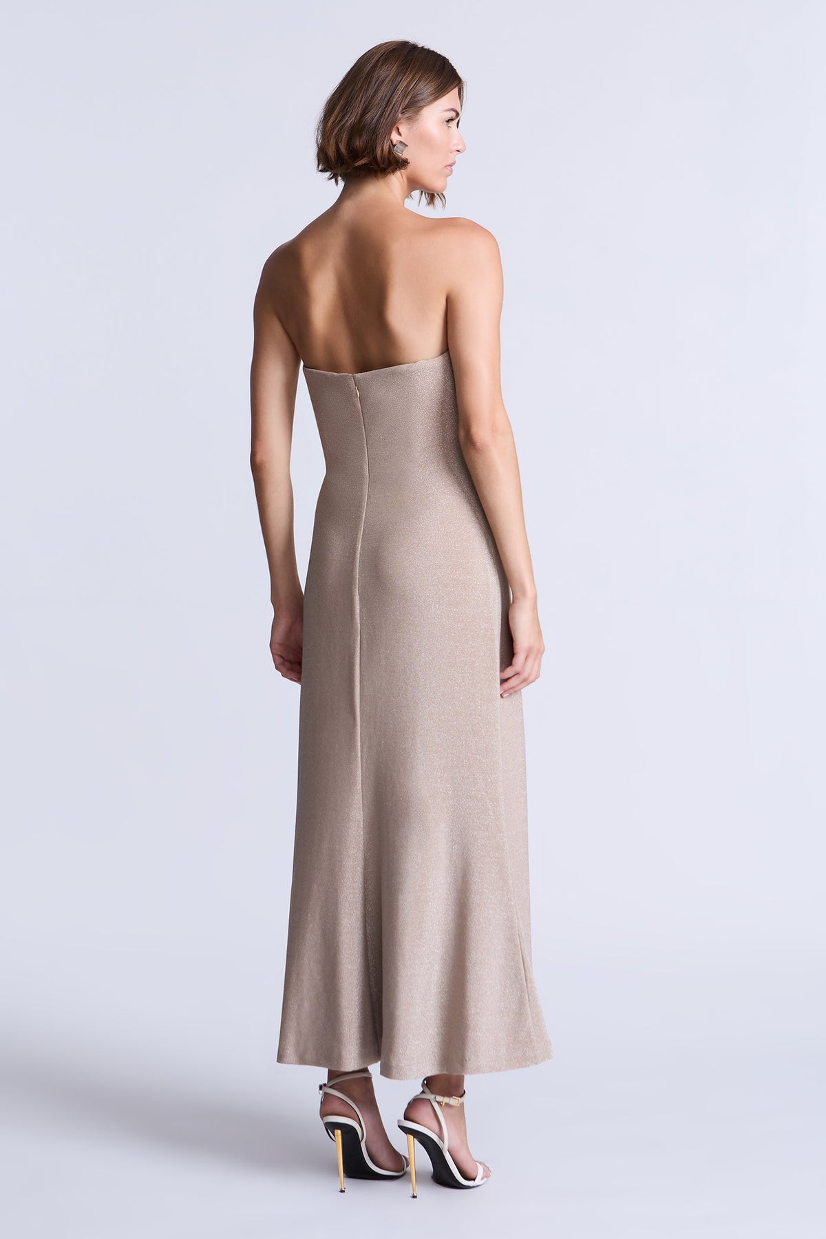 BCBGMAXAZARIA Lola Dress Champagne metallic-knit dress featuring an ankle-length silhouette with an airy fluid flare.