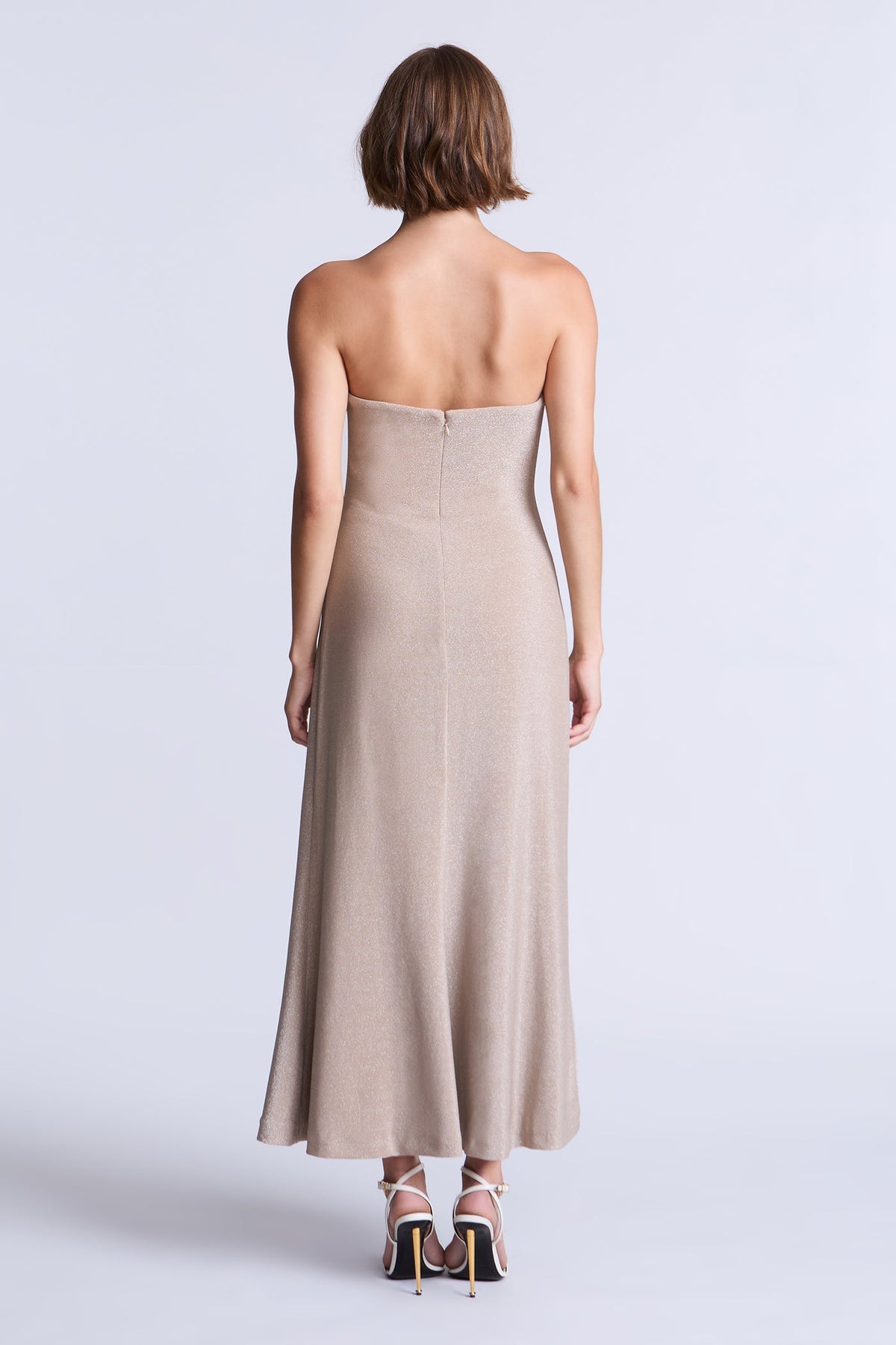 BCBGMAXAZARIA Lola Dress Champagne metallic-knit dress featuring an ankle-length silhouette with an airy fluid flare.