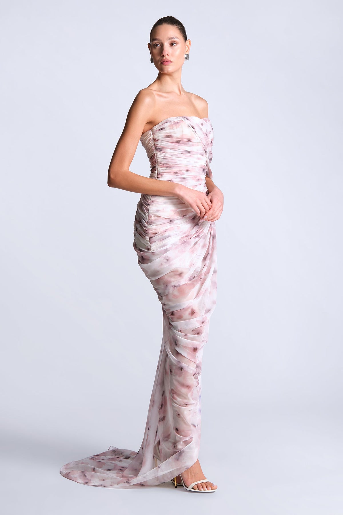 BCBGMAXAZARIA Isabella Printed Gown Draped printed in sheer chiffon with a soft fluid hand and a blurred floral wash.
