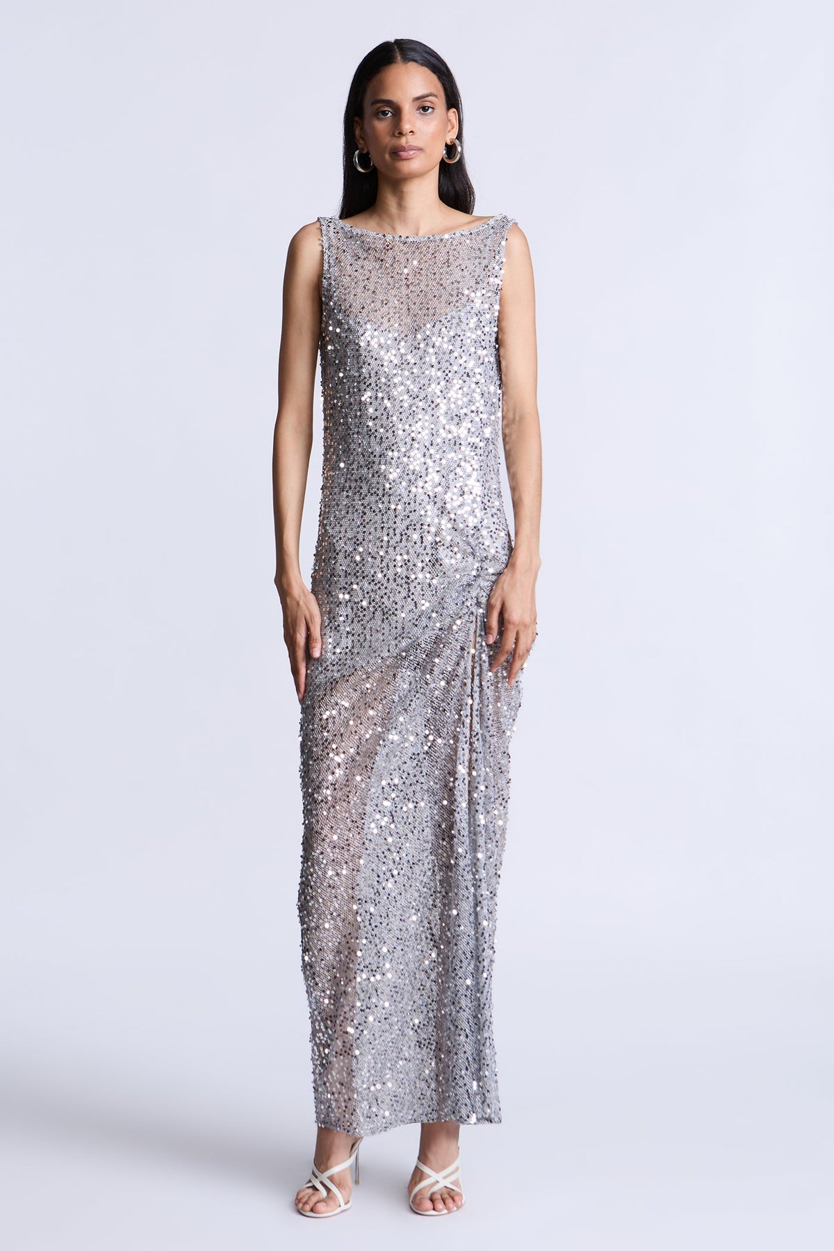 BCBGMAXAZARIA Lorraine Gown Silver sequin crafted with a fluid light-catching finish that glimmers