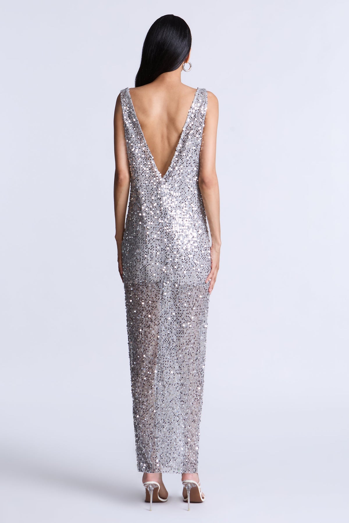 BCBGMAXAZARIA Lorraine Gown Silver sequin crafted with a fluid light-catching finish that glimmers