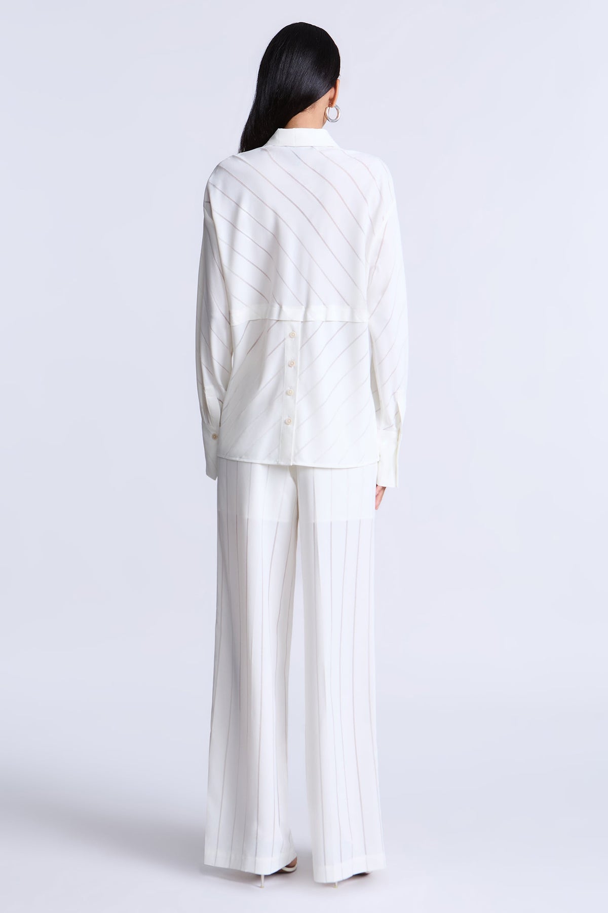 BCBGMAXAZARIA Eden Fluid pinstripe shirt designed with a relaxed drape and subtle