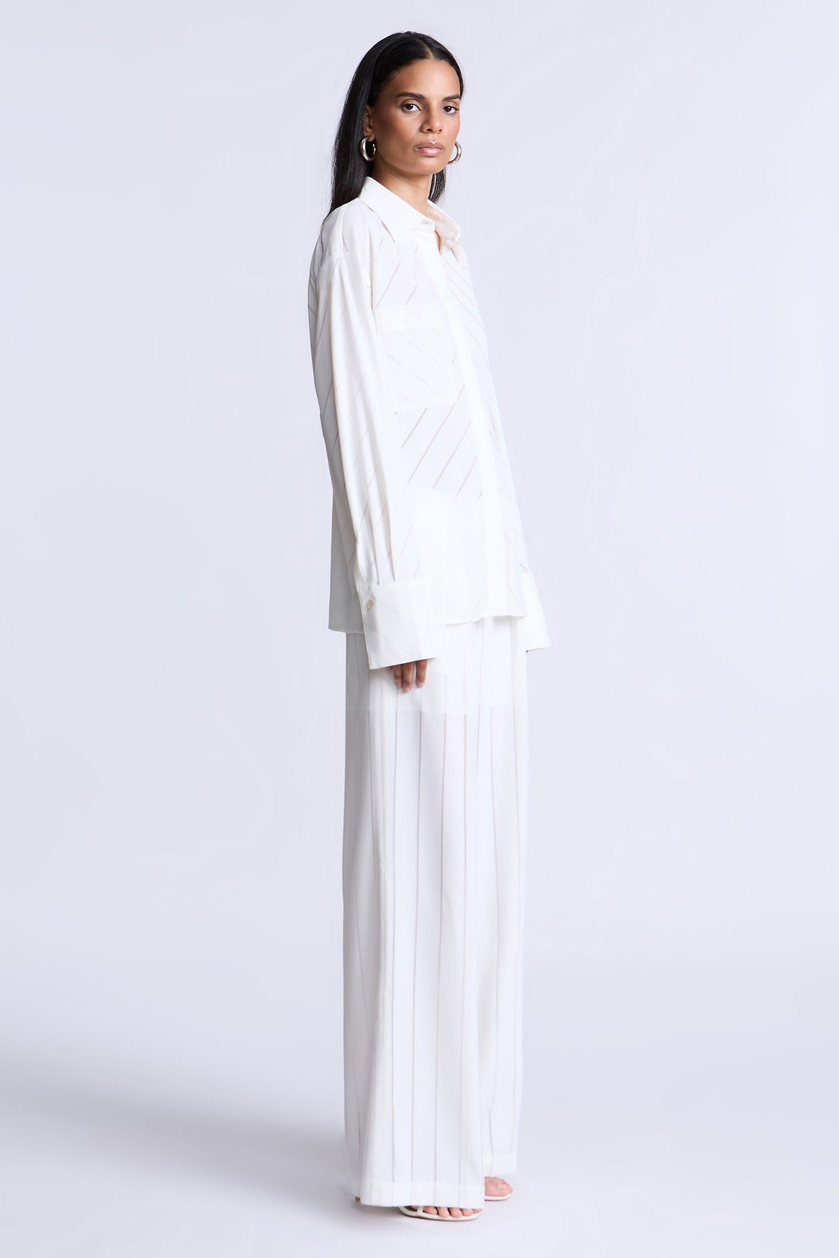 BCBGMAXAZARIA Eden Fluid pinstripe shirt designed with a relaxed drape and subtle