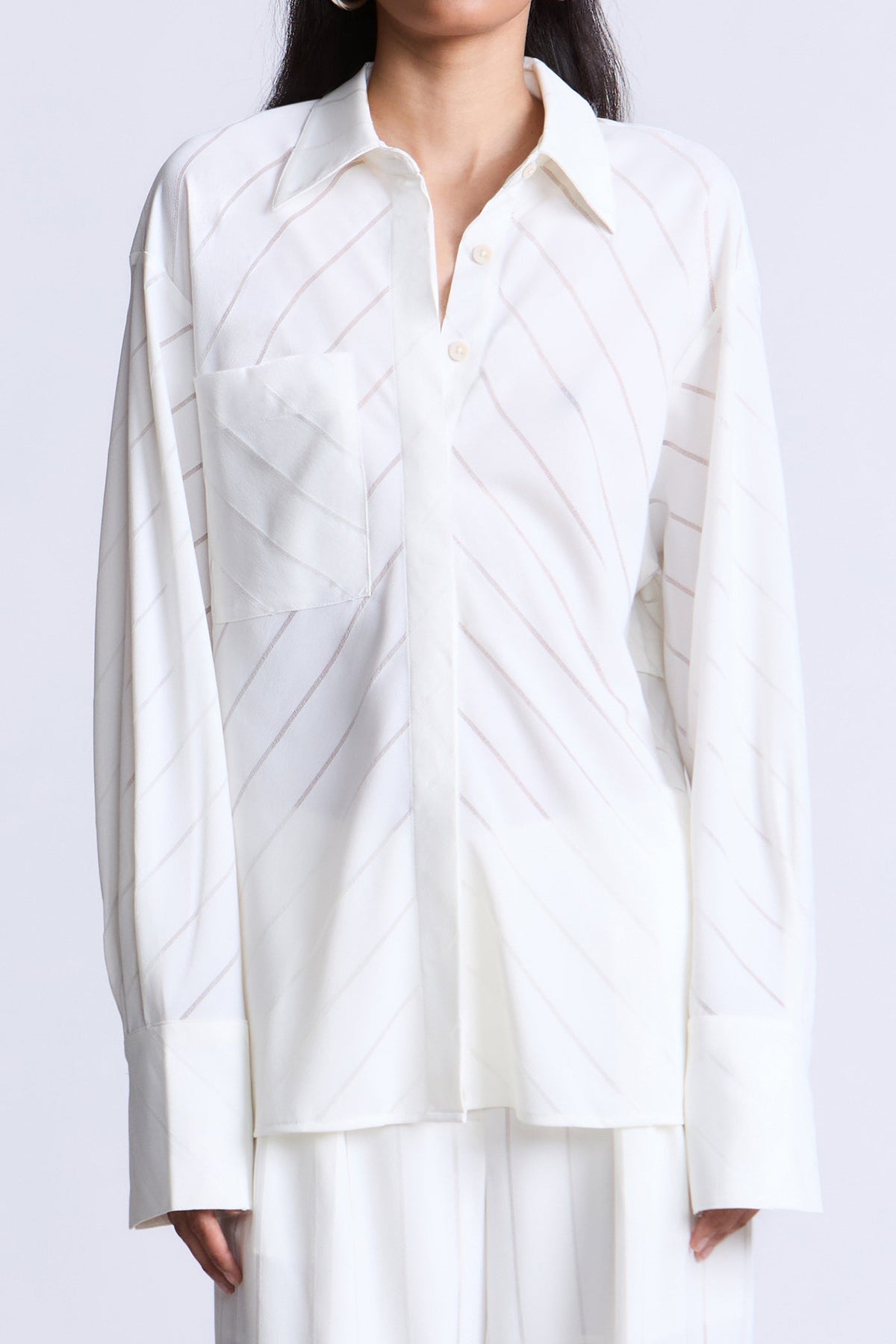BCBGMAXAZARIA Eden Fluid pinstripe shirt designed with a relaxed drape and subtle