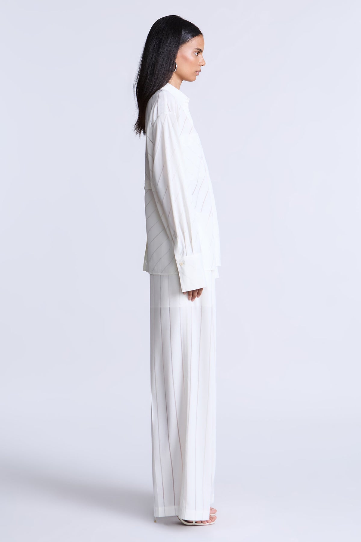 BCBGMAXAZARIA Eden Fluid pinstripe shirt designed with a relaxed drape and subtle