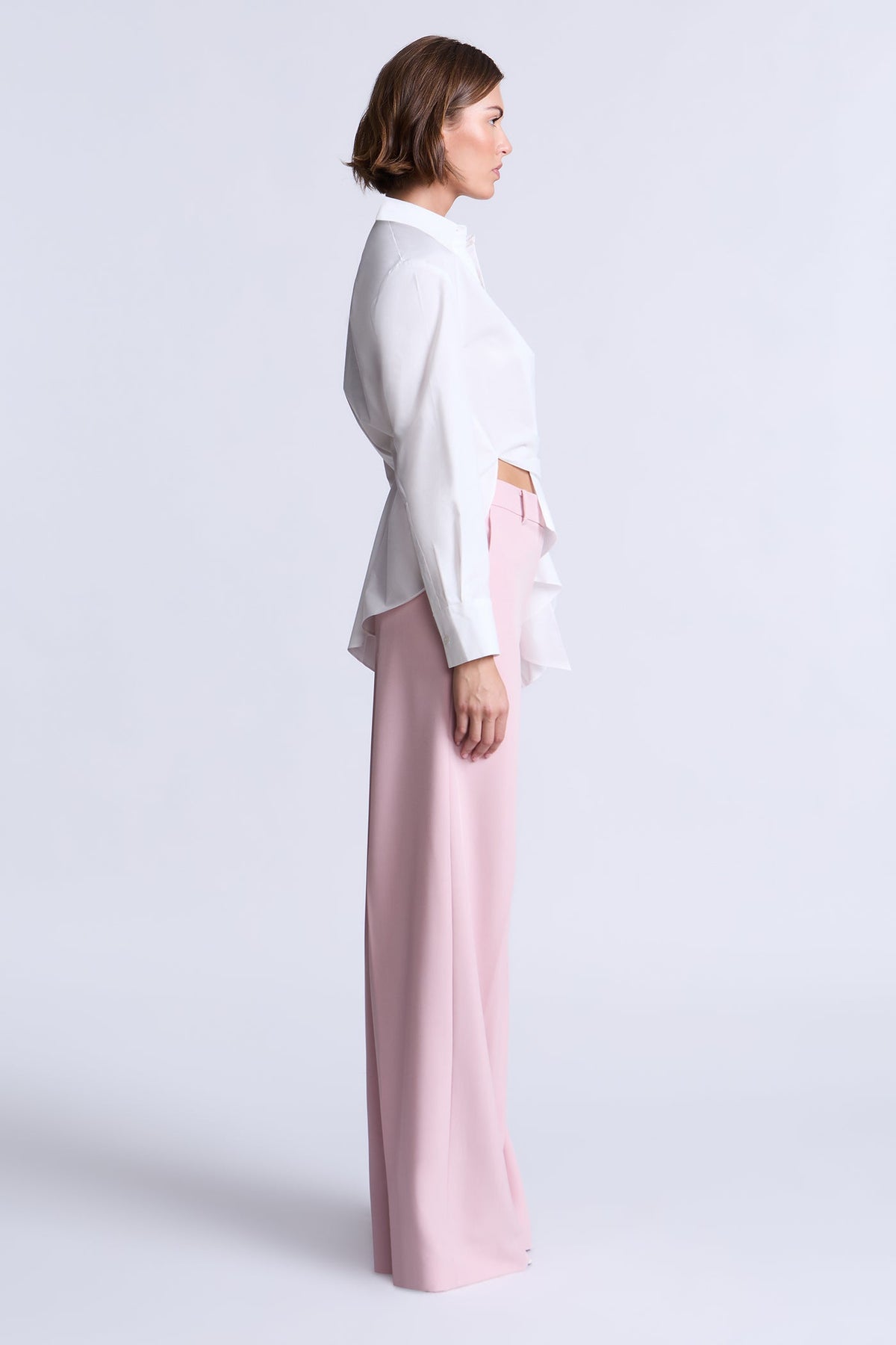 BCBGMAXAZARIA Crisp cotton wrap Tay shirt with a soft breathable feel and an unexpected asymmetric finish