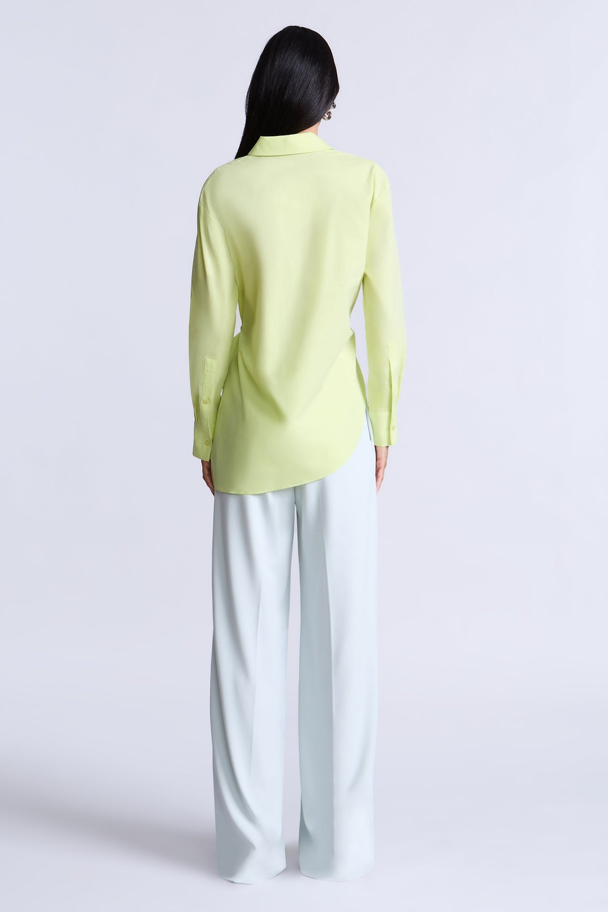 BCBGMAXAZARIA Crisp cotton wrap Tay shirt with a soft breathable feel and an unexpected asymmetric finish