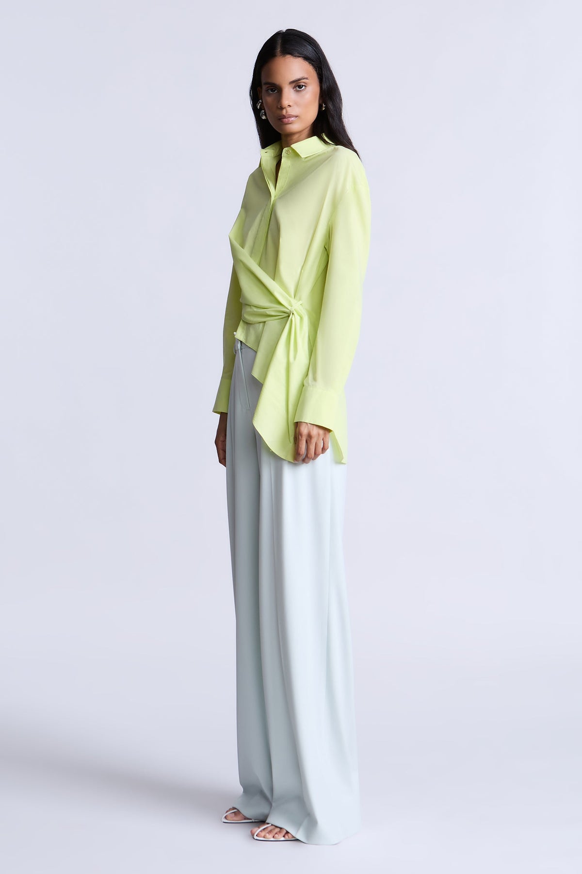 BCBGMAXAZARIA Crisp cotton wrap Tay shirt with a soft breathable feel and an unexpected asymmetric finish
