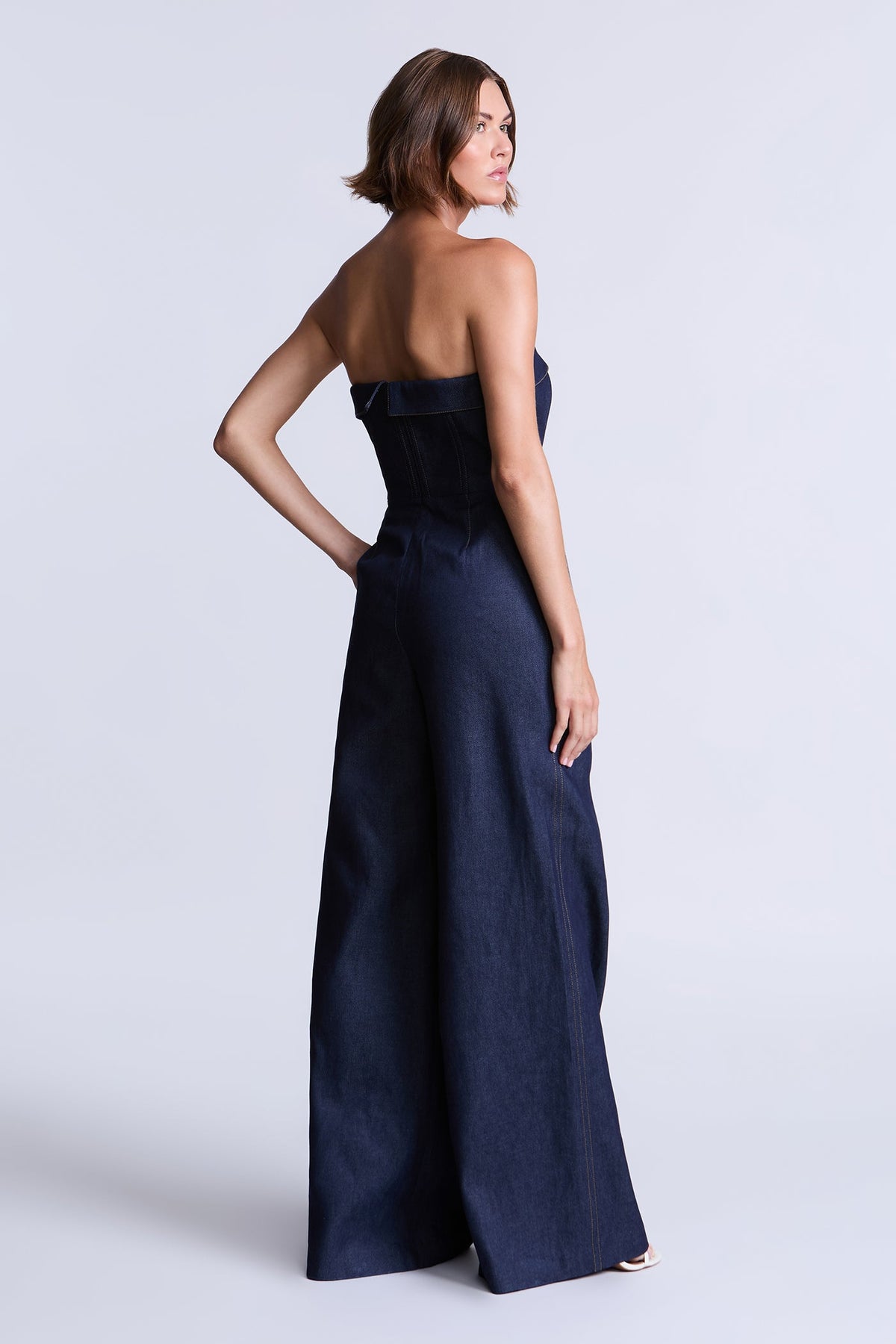 BCBGMAXAZARIA Savannah Strapless denim jumpsuit with a sculpted corset-inspired bodice