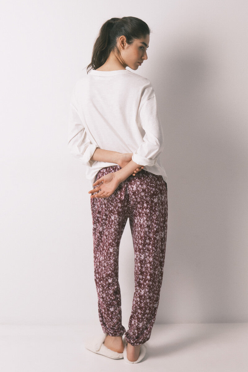 Women Secret Long trousers with floral print