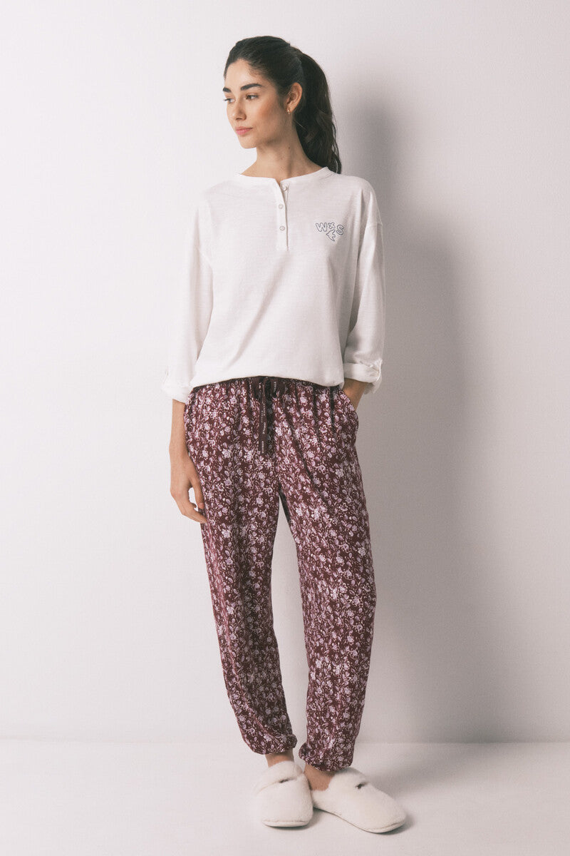 Women Secret Long trousers with floral print