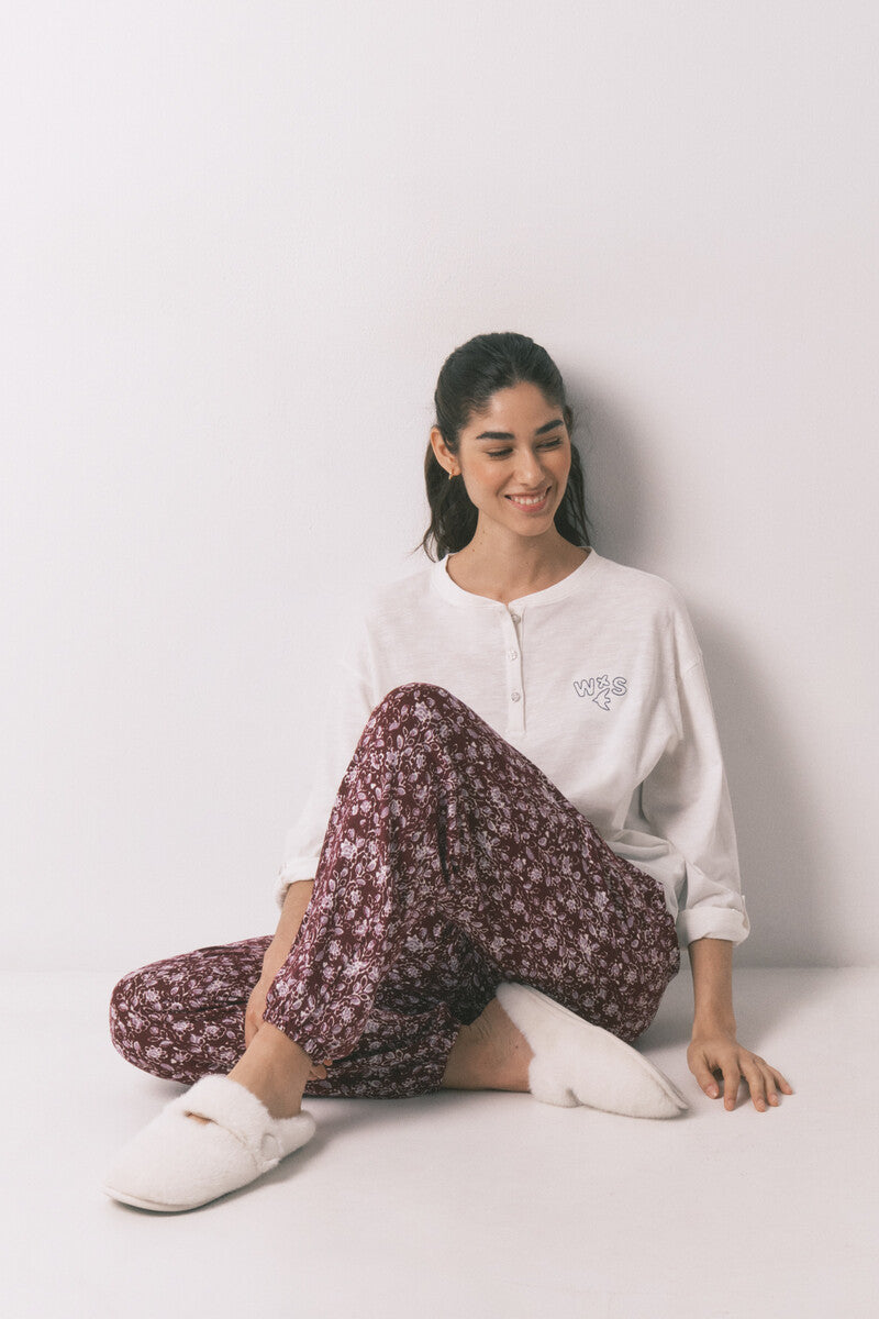 Women Secret Long trousers with floral print