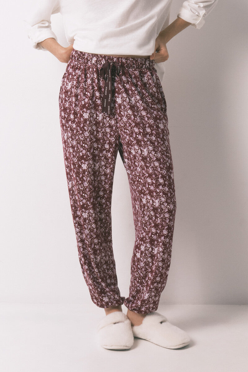 Women Secret Long trousers with floral print